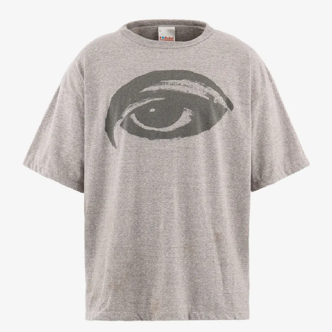 SAINT Mxxxxxx Graphic T-Shirt – Distinctive Streetwear front (2) SAINT Mxxxxxx Eye T-Shirt - Image 1