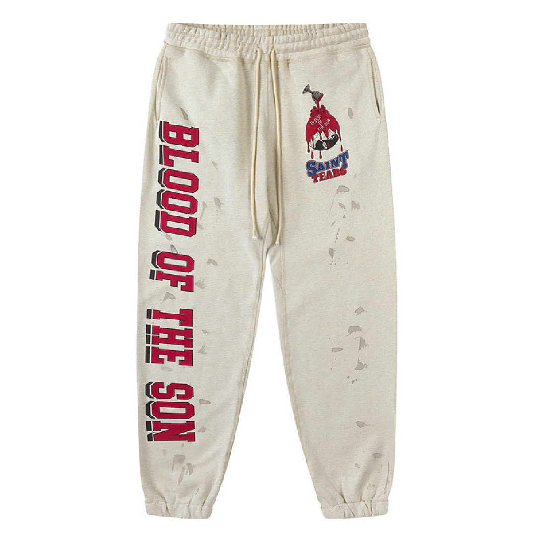 SAINT Mxxxxxx × Denim Tears Holy Grail Graphic Sweatpants – Grey front SAINT Mxxxxxx × Denim Tears Holy Grail Graphic Sweatpants - Image 1