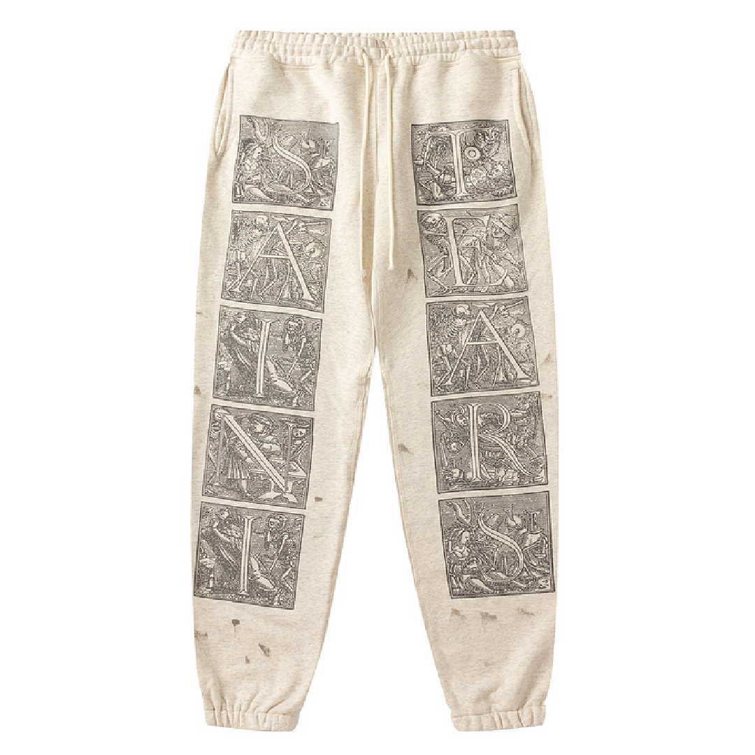 SAINT Mxxxxxx × Denim Tears Mural Graphic Sweatpants front SAINT Mxxxxxx × Denim Tears Mural Graphic Sweatpants - Image 1